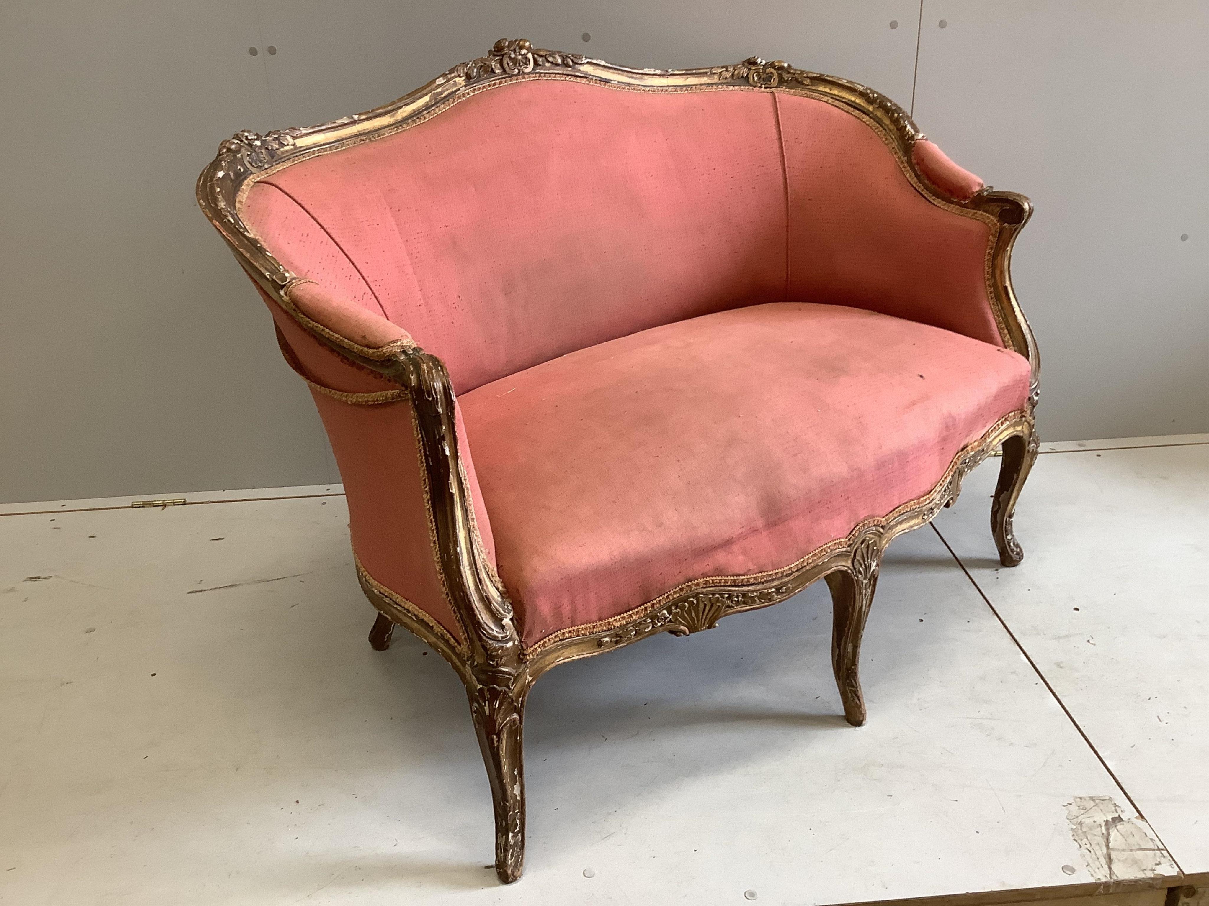 A French giltwood and composition settee, width 126cm, depth 60cm, height 91cm. Condition - fair